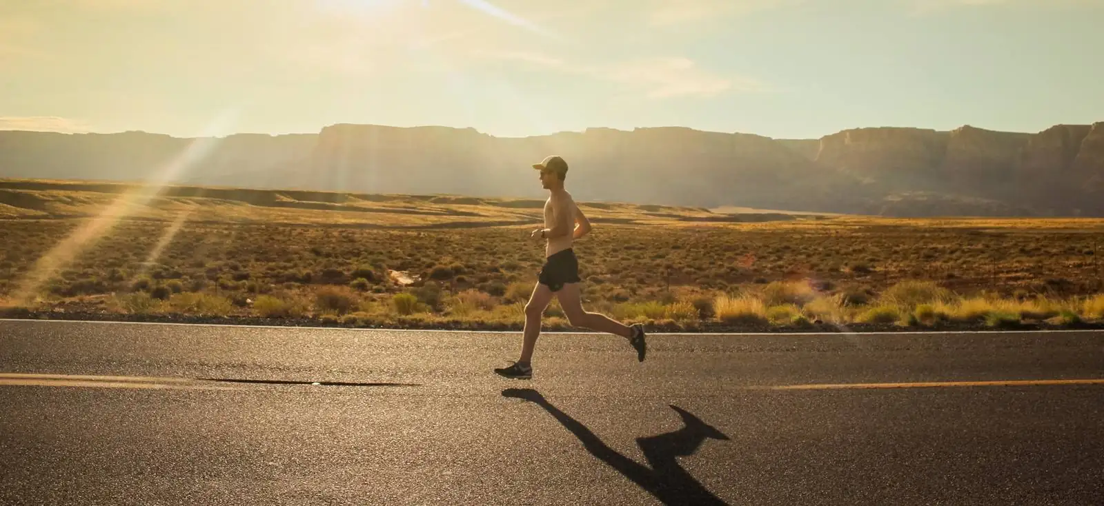 Runner on a trail at golden hour